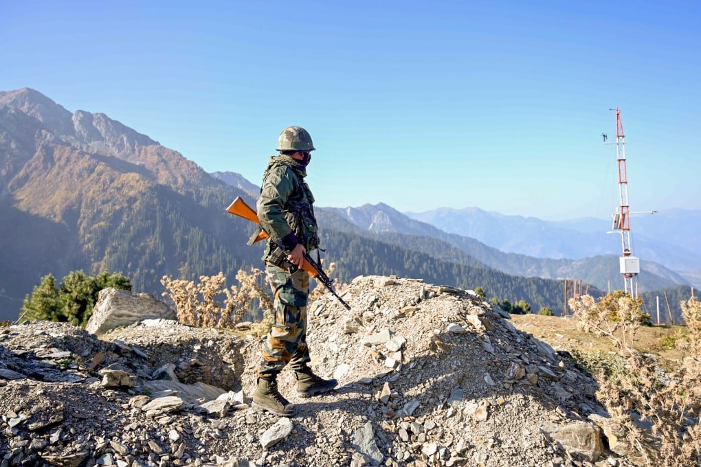 An Indian Army soldier stands guard near the border with Pakistan. Photo: AFP