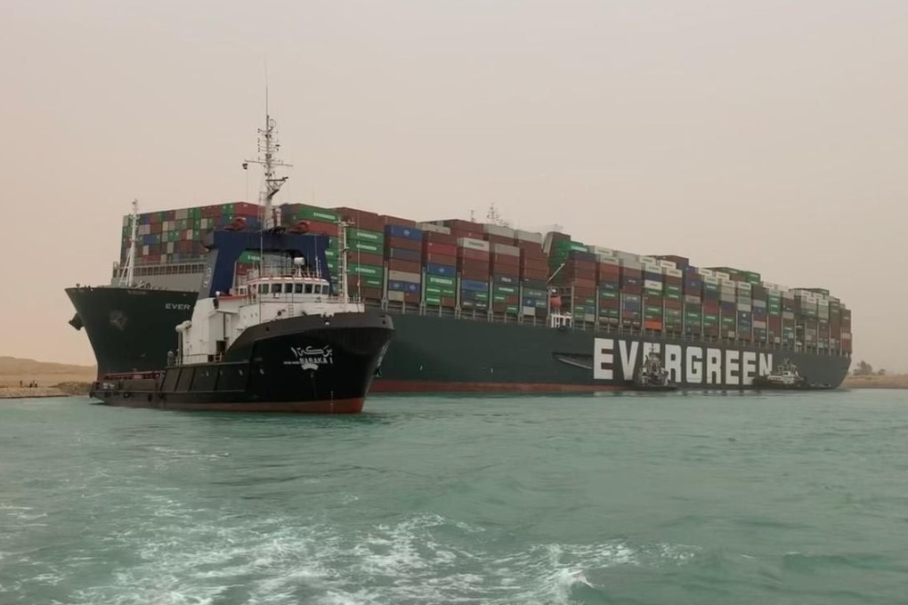 Since the Ever Given ran aground on Tuesday, efforts to free the container vessel with dredgers, digging and the aid of high tides have yet to push it aside. Photo: Xinhua