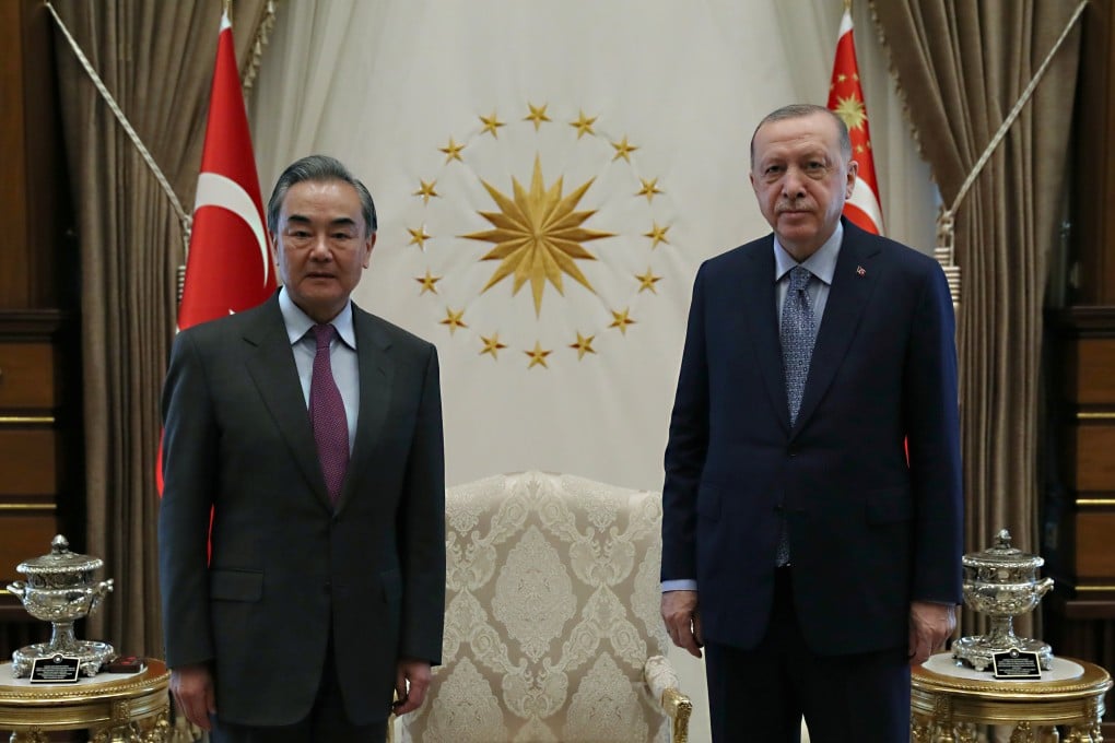 Turkish President Tayyip Erdogan (right) meets Chinese Foreign Minister Wang Yi in Ankara on Thursday. Photo: Reuters