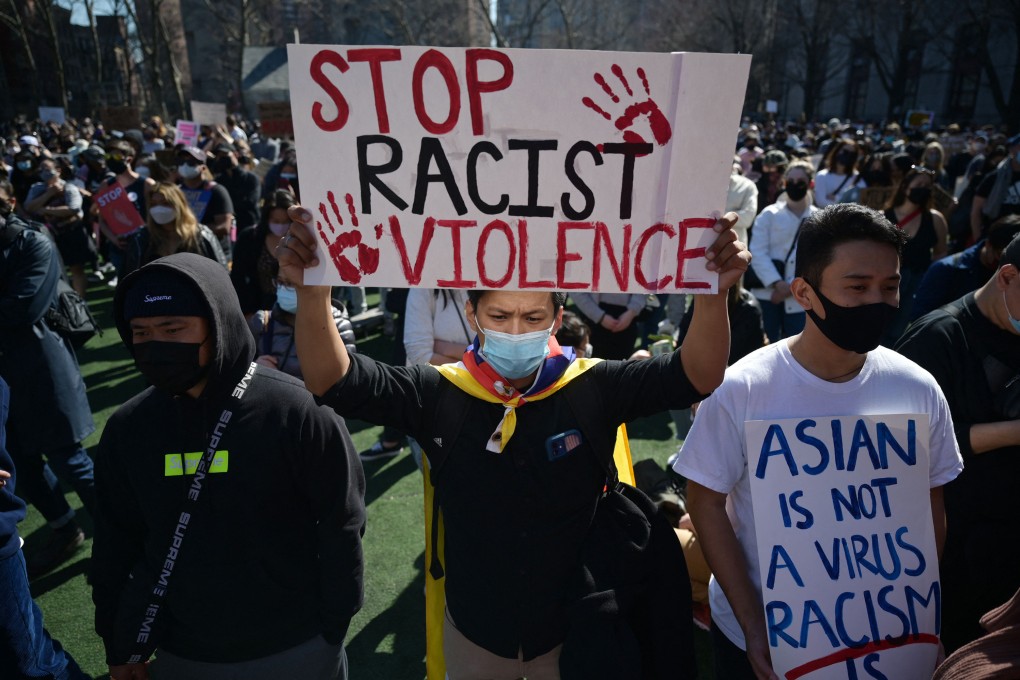 Members and supporters of the Asian-American community attend a rally against hate at Columbus Park in New York City on March 21. Photo: AFP/Getty Images/TNS