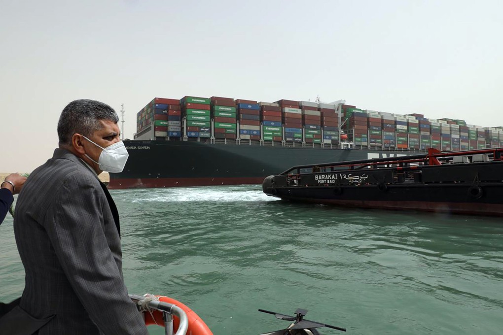 The Ever Given, a ship that is longer than the Eiffel Tower and can carry 20,000-containers, has not moved since its grounding in the Suez Canal on Tuesday. Photo: AP