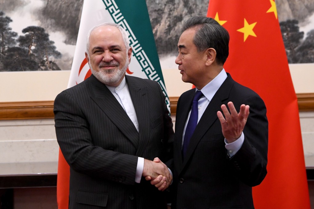 Iran’s Foreign Minister Mohammad Javad Zarif and China’s Foreign Minister Wang Yi at the Diaoyutai State Guesthouse in Beijing in December 2019. Photo: EPA-EFE