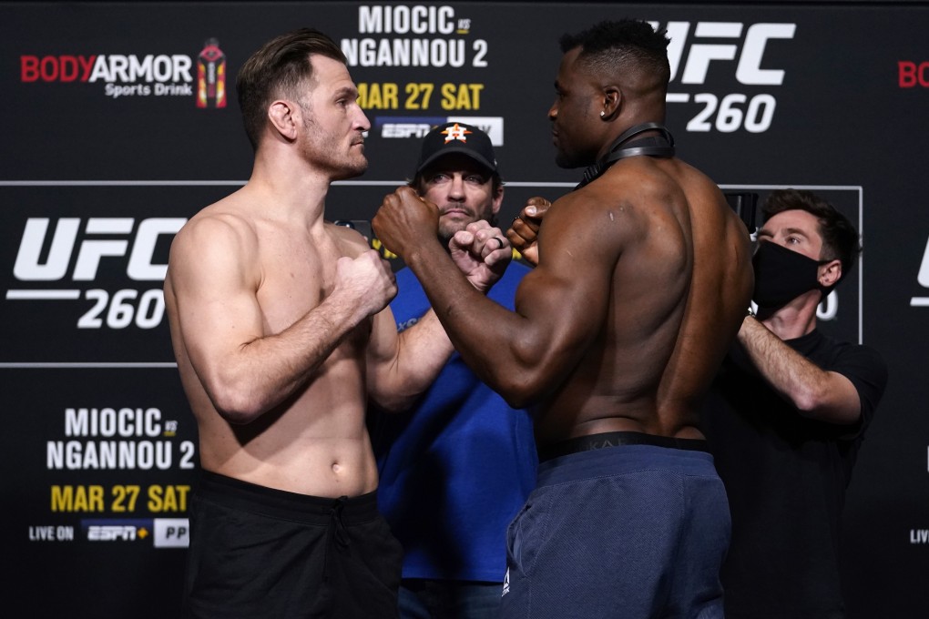 Stipe Miocic (left) and Francis Ngannou  face off during the UFC 260 weigh-in. Photos: Jeff Bottari/Zuffa LLC