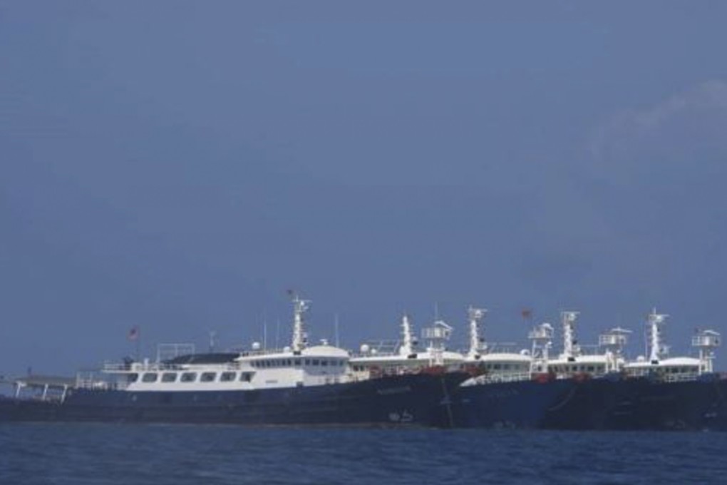 The Chinse boats are moored at the Whitsun Reef in the South China Sea. Photo: Philippine Coast Guard/National Task Force-West Philippine Sea via AP