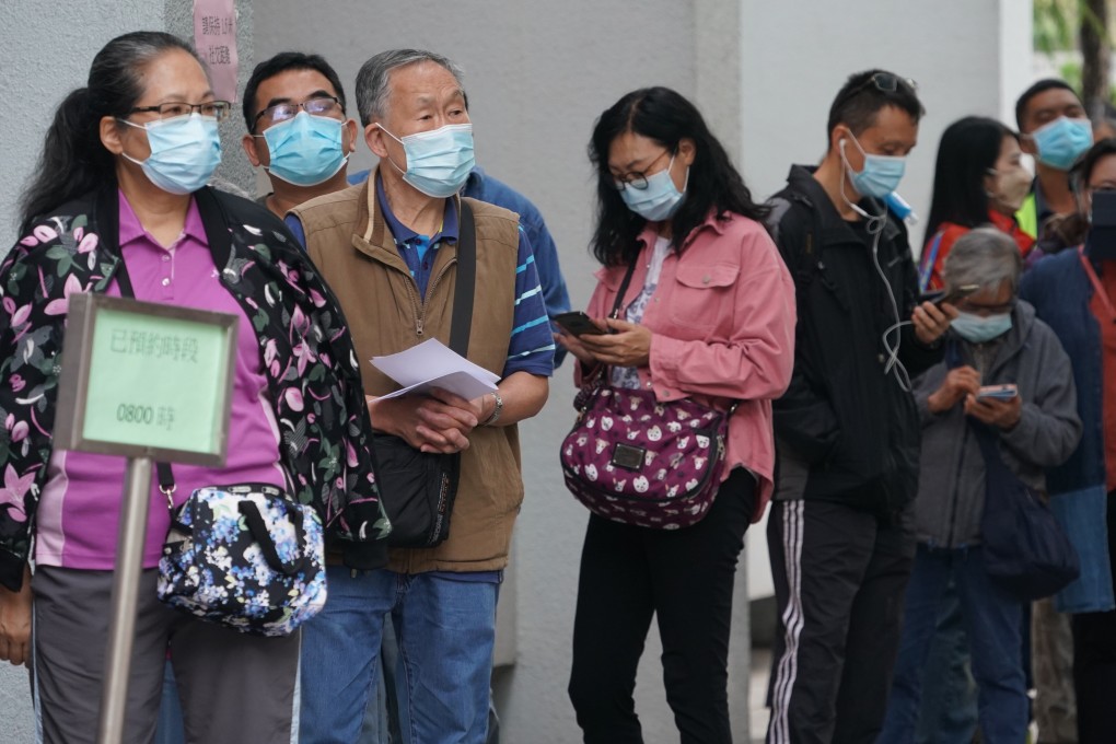 People queue up for Covid-19 vaccinations on Saturday in Sha Tin. Photo: Felix Wong