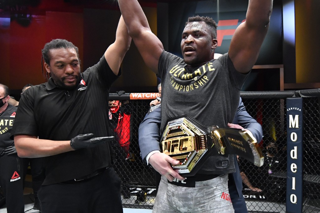 Francis Ngannou reacts after his victory over Stipe Miocic in their heavyweight championship fight at UFC 260. Photos: Jeff Bottari/Zuffa LLC