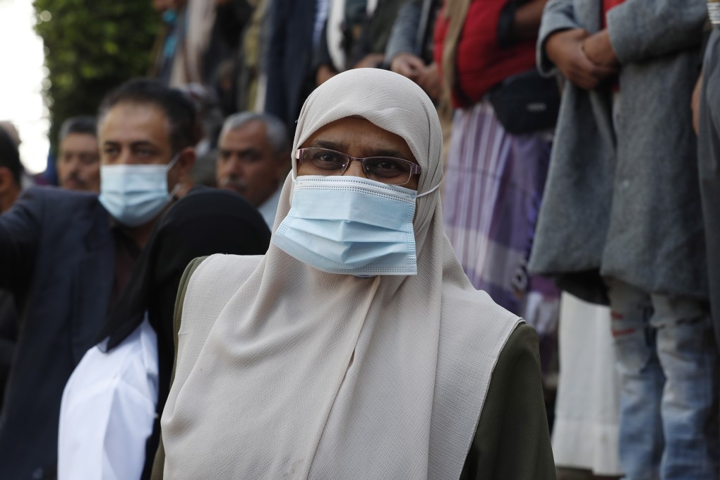 Yemenis wear protective face masks at a hospital in Sanaa, Yemen on Wednesday. Photo: EPA-EFE
