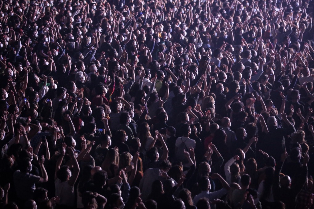 People attend a rock concert in Barcelona on Saturday. Photo: Bloomberg