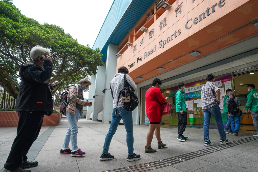 People queue up for Covid-19 vaccines at Sha Tin Community Vaccination Centre. Photo: Felix Wong