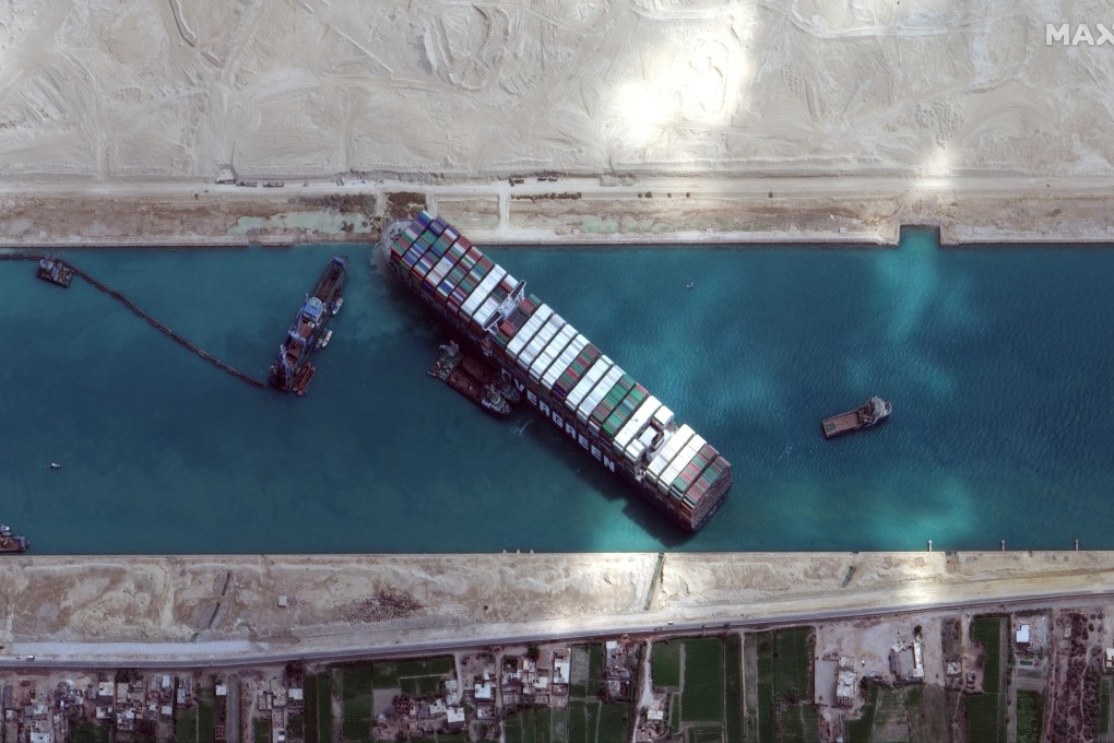 Satellite imagery released by Maxar Technologies shows the MV Ever Given container ship in the Suez Canal on Sunday morning. Photo: Handout via Reuters