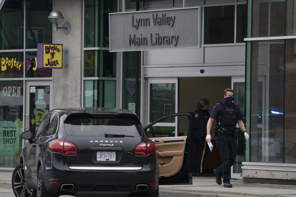 Canadian police outside the Lynn Valley Library in North Vancouver. Photo: The Canadian Press via AP