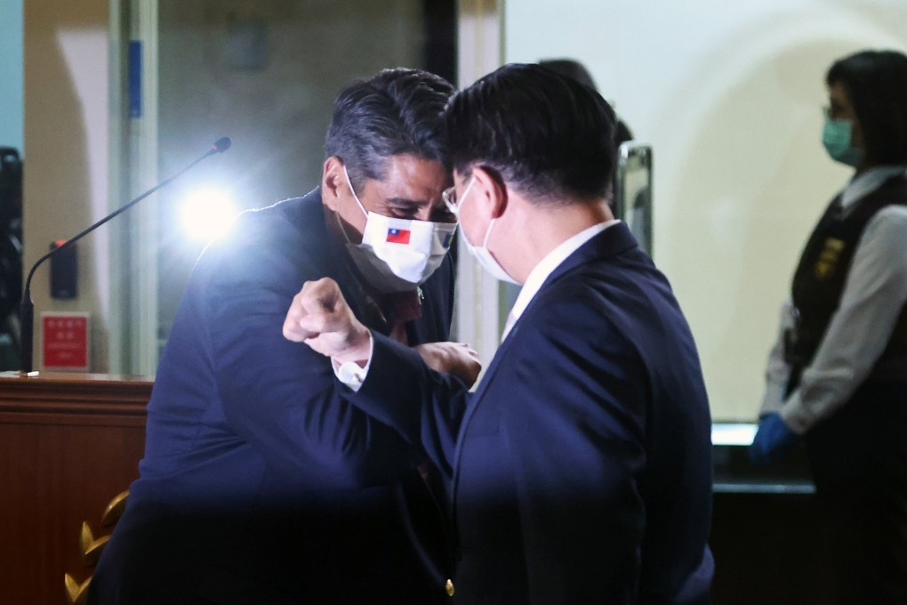 Palau President Surangel Whipps greets Taiwanese Foreign Minister Joseph Wu at Taoyuan International Airport in Taoyuan, Taiwan, on Sunday. Photo: Reuters