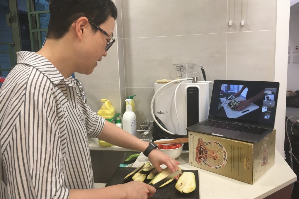 A friend of Grace Wu’s from Hong Kong follows a class on how to make a carbonara sauce on World Kitchen Club.