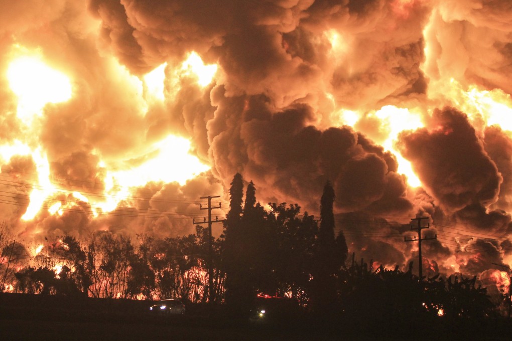 Smoke rises during a fire at the Balongan oil refinery in Indonesia on Monday. Photo: EPA-EFE