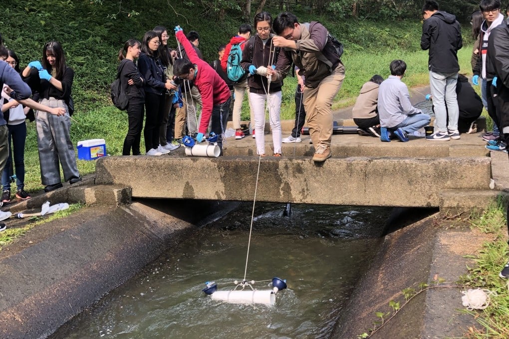 The School of Science and Technology at the Open University of Hong Kong (OUHK) has been part of FreshWater Watch. Here students practice water sampling. Photo: Open University of Hong Kong