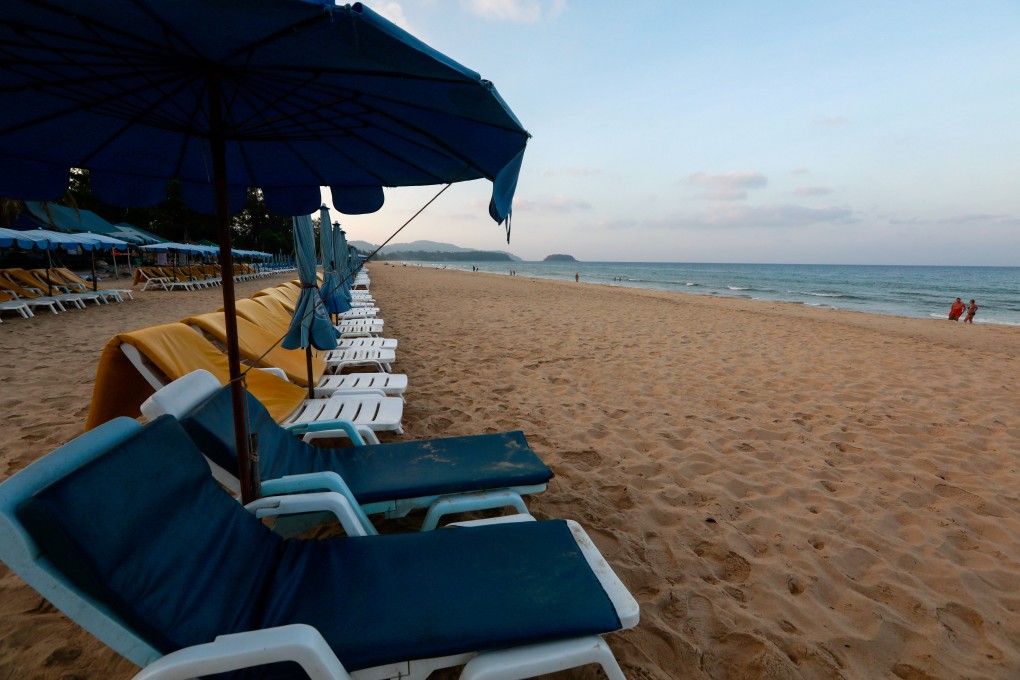 FILE PHOTO: Empty chairs are seen on a beach which is usually full of tourists, amid fear of coronavirus in Phuket, Thailand March 11, 2020. REUTERS/Soe Zeya Tun/File Photo
