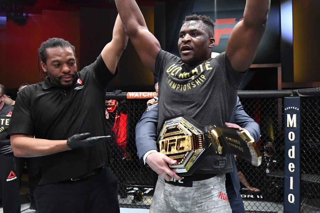Francis Ngannou celebrates after his victory over Stipe Miocic in their heavyweight title fight at UFC 260. Photo: Jeff Bottari/Zuffa LLC