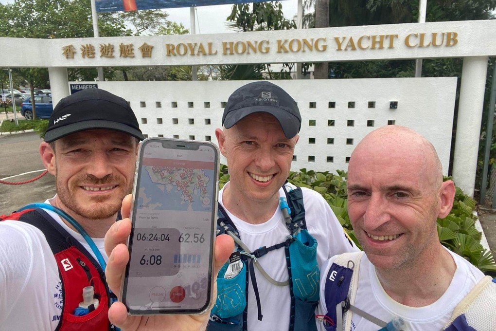 Andy McGirr, Martin Cerullo and Keith Williamson show off their time after completing the loop. Photo: Handout