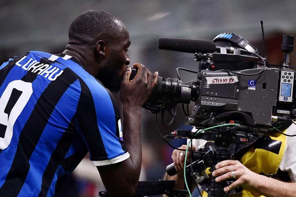 Inter Milan’s Belgian forward Romelu Lukaku kisses a television broadcast camera after scoring against AC Milan in 2019. Photo:AFP