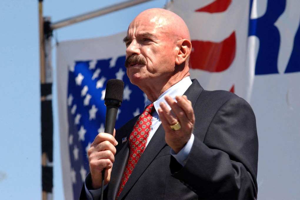 G. Gordon Liddy speaks during a rally in support of the US troops in Iraq on April 12, 2003. File photo: AFP