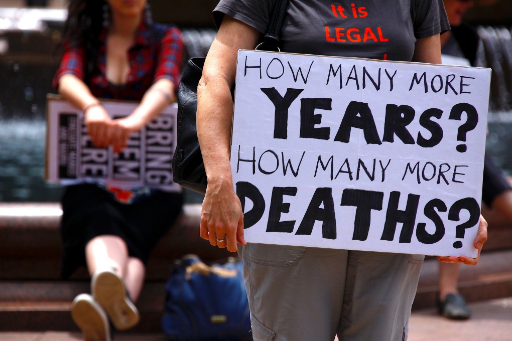 Refugee advocates in Sydney protest against the treatment of asylum seekers at offshore detention centres run by Canberra. Photo: Reuters