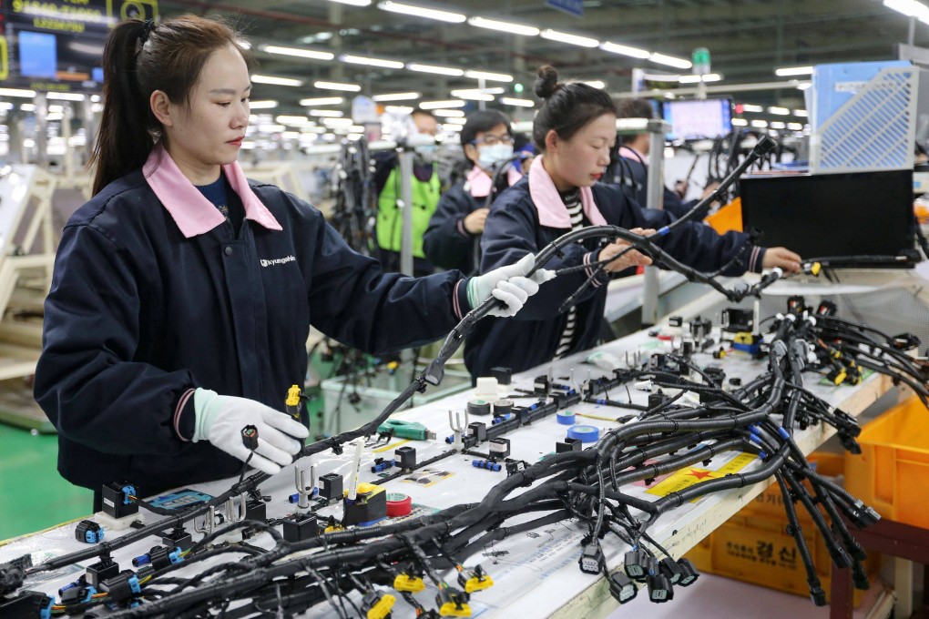The official manufacturing purchasing managers’ index (PMI) 51.9 in March from 50.6 in February, according to data released by the National Bureau of Statistics (NBS). Photo: AFP
