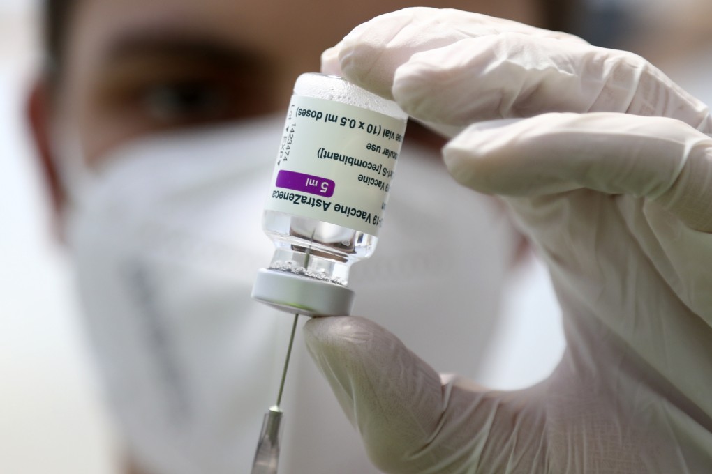 A medical worker prepares a syringe with the AstraZeneca coronavirus jab at a vaccine centre in Ebersberg, Germany on March 22. Photo: AP