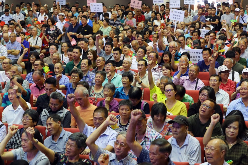 Villagers attend a rally against a court ruling on small-house rights at Heung Yee Kuk Building in 2019. Appeal judges in January 2021 overturned the lower court ruling to reinstate male indigenous villagers’ full rights to build three-storey homes on both private and government-sourced land in space-starved Hong Kong. Photo: Edmond So