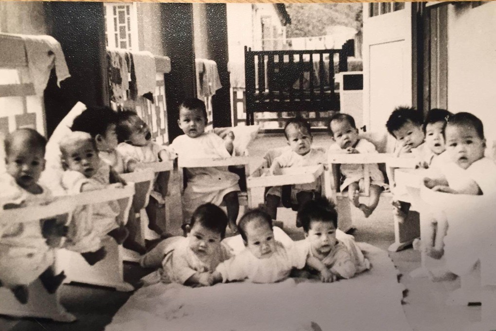 Infants at the Po Leung Kuk children’s home in October 1961, including one believed to be Martin (crying, fourth from left). Photo: Claire Martin / Red Door News