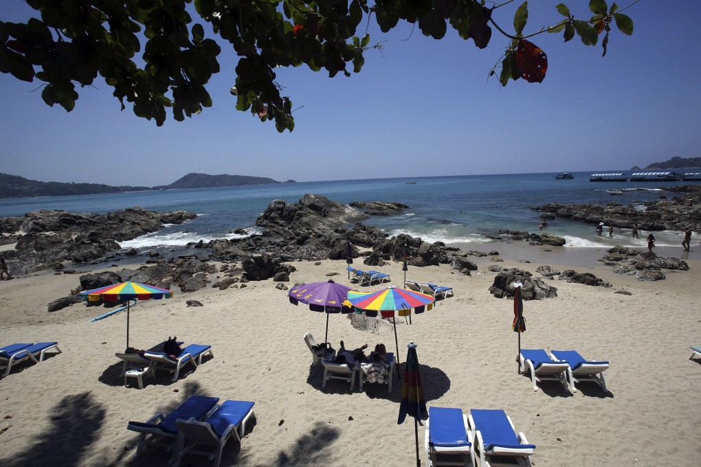 Tourists are seen on Patong Beach in Phuket before the pandemic. From July, people who have been vaccinated will not need to quarantine in the province, as Thailand seeks to restart its tourism industry. Photo: AP