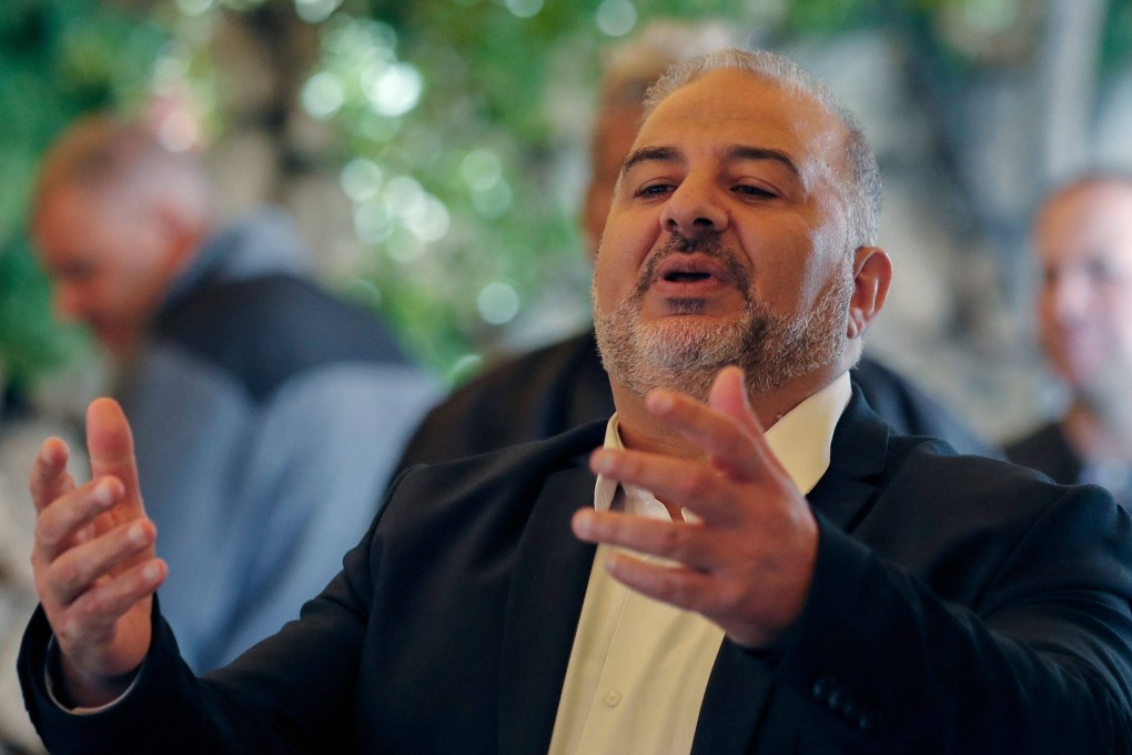 Mansour Abbas, head of the conservative Islamic Raam party, speaks to a crowd in the Israeli village of Maghar in March. Photo: AFP