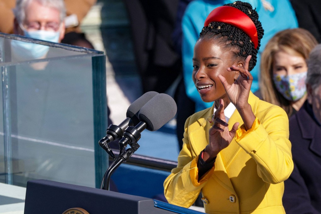 Amanda Gorman recites her poem The Hill We Climb during the inauguration of US President Joe Biden in Washington, om January 20. Photo: Getty Images/AFP