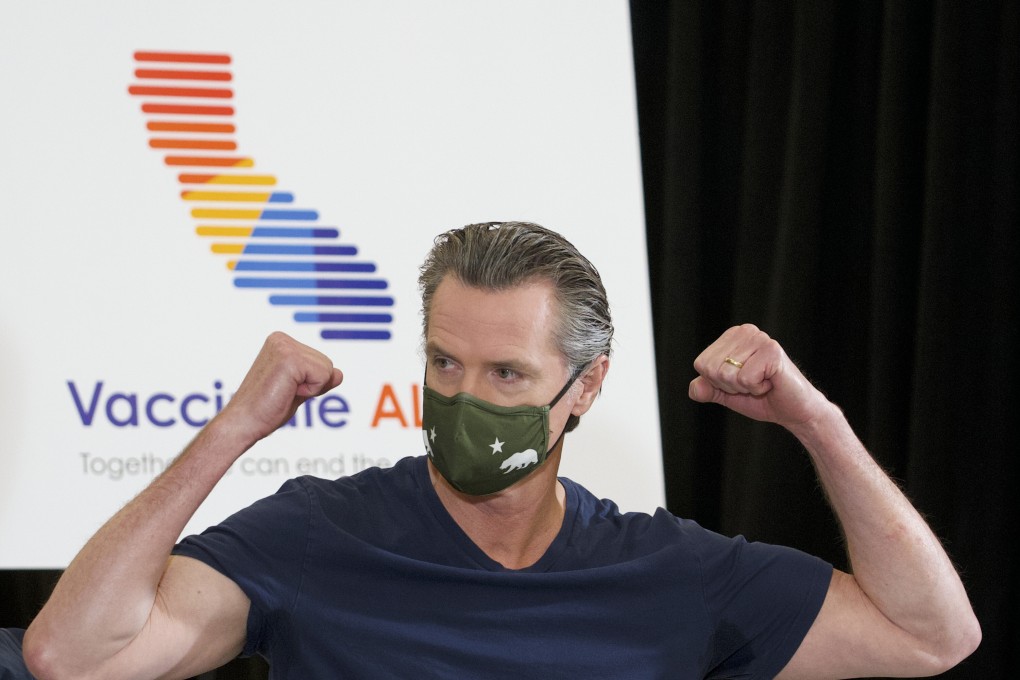 California Governor Gavin Newsom reacts after getting vaccinated against Covid-19 in Los Angeles on Thursday. Photo: AP
