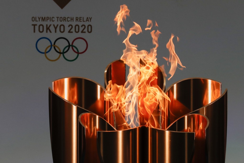 The celebration cauldron is seen lit on the first day of the Tokyo 2020 Olympic torch relay. Photo: AP
