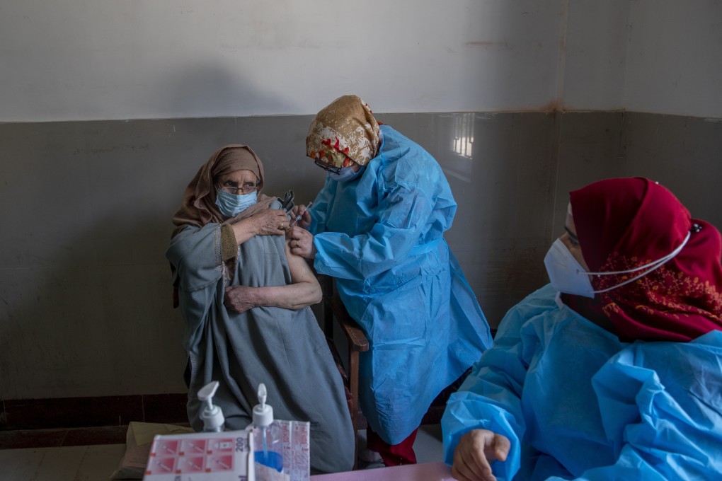 A woman receives the Covishield Covid-19 vaccine at a health centre in Srinagar, Indian-controlled Kashmir. Photo: AP