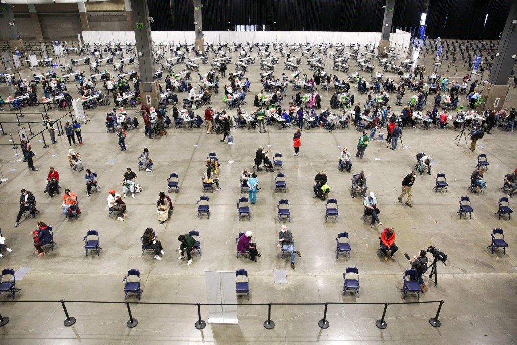 People sit in an observation area after receiving the Pfizer Covid-19 vaccine in Seattle, US. Photo: AFP