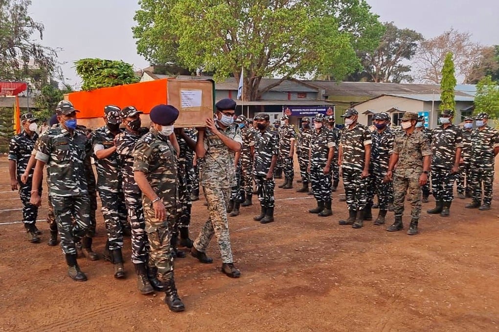 Members of Indian security forces carry the coffin of one of their colleagues who died during a gun battle with Maoist rebels. Photo: AFP