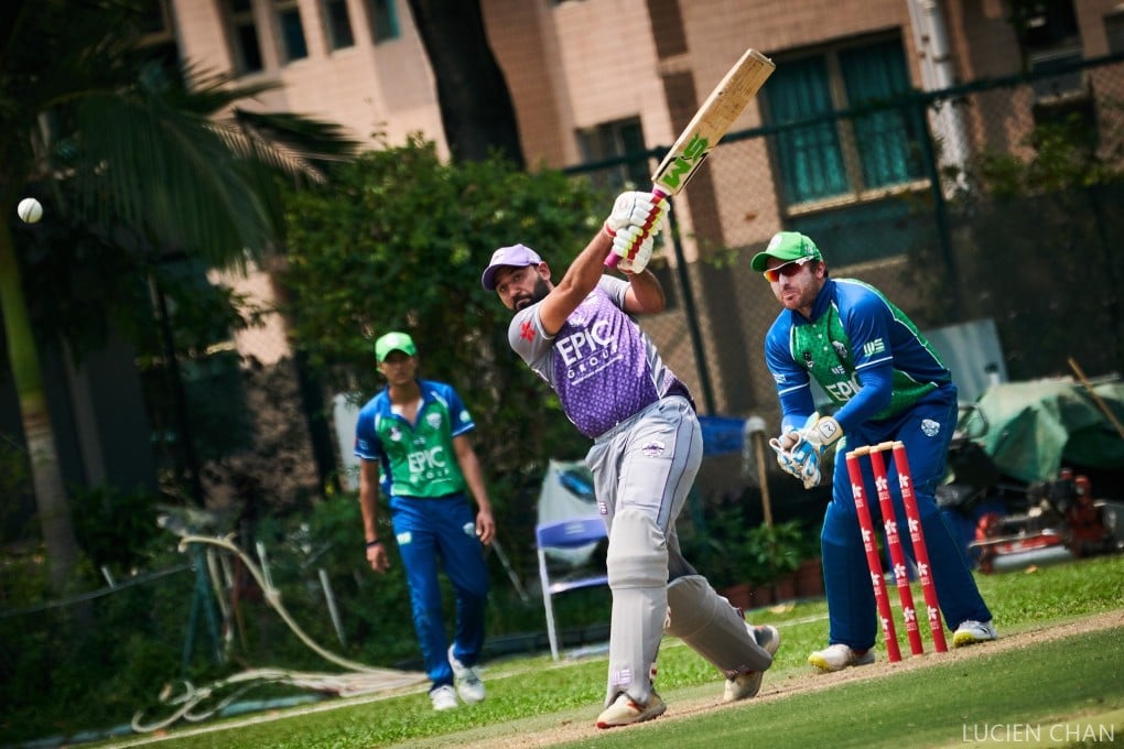Kowloon Lions’ Babar Hayat smashes the ball during his innings against Hong Kong Islanders. Photo: Lucien Chan