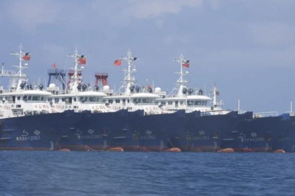 In this March 7, 2021, photo some of the 220 Chinese vessels are seen moored at Whitsun Reef in the South China Sea. The Philippine government expressed concern after spotting more than 200 Chinese fishing vessels. Photo: Photo: Philippine Coast Guard/National Task Force-West Philippine Sea via AP