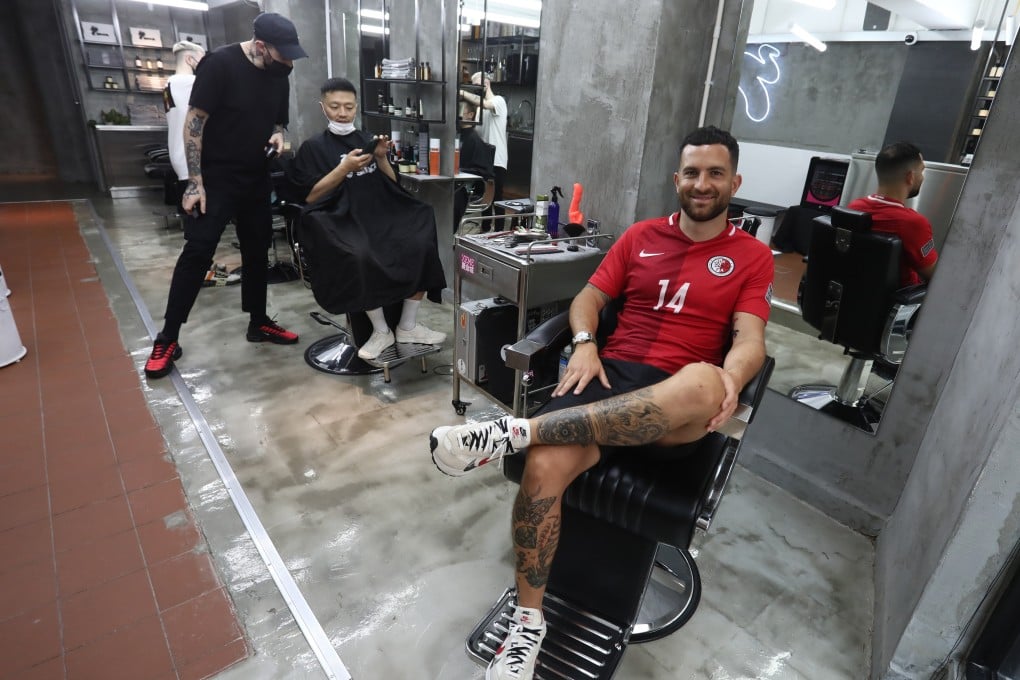 Portrait of Jack Sealy, former HK national soccer player, at his barbershop Sauce in Central. 02APR21 SCMP / Jonathan Wong