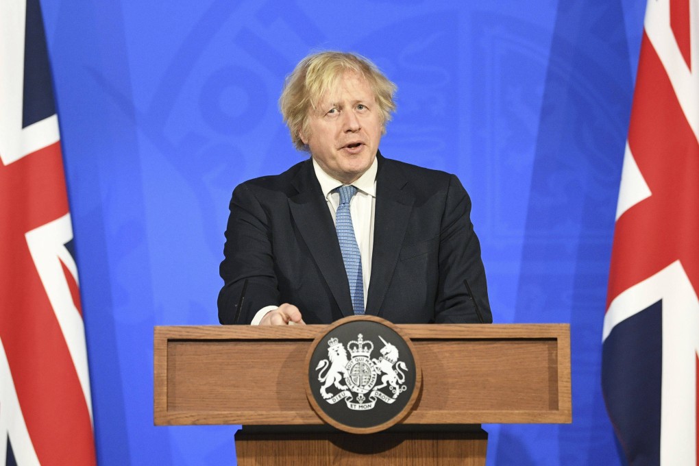 Britain’s Prime Minister Boris Johnson confirmed that the government will test out a contentious “vaccine passport” system to help travel and large events return safely. Photo: AP