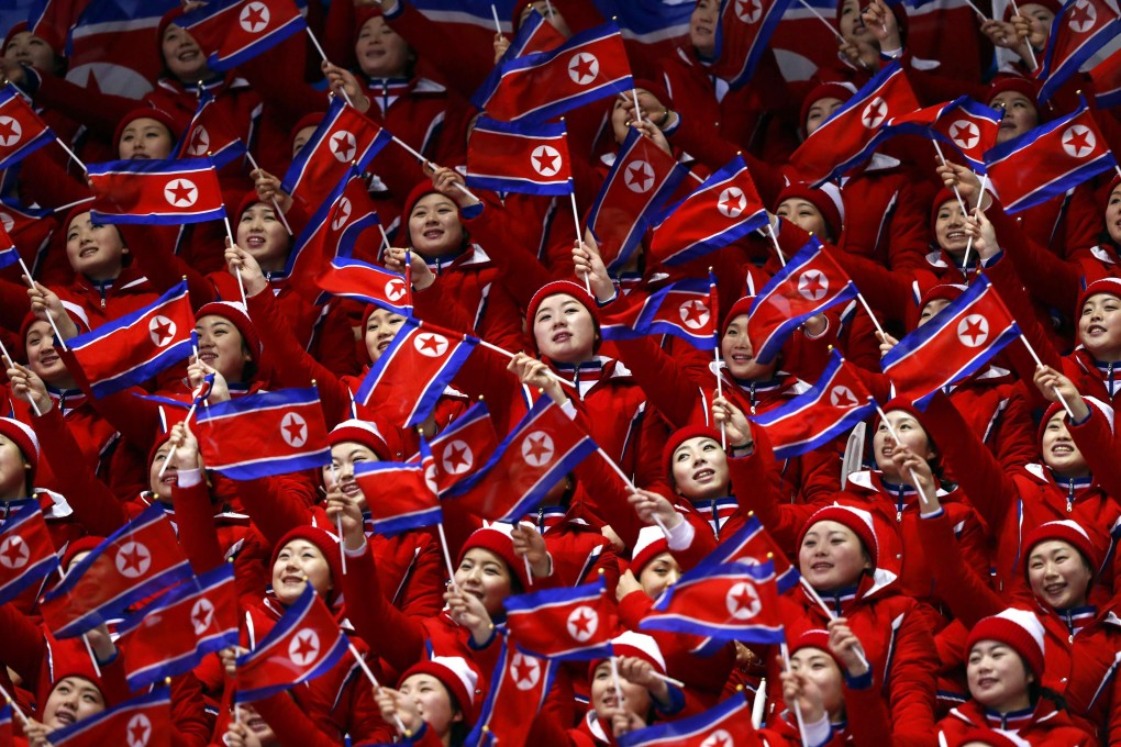 North Korean cheerleaders wave their national flags at the 2018 Winter Olympics in Pyeongchang, South Korea. Photo: Reuters