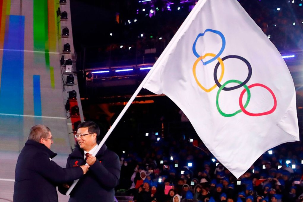 During the closing ceremony of the 2018 Winter Games in South Korea, Thomas Bach, the president of the International Olympic Committee (left), passed the Olympic flag in 2018 to Chen Jining, the mayor of Beijing, which will host the 2022 Winter Games. Photo: AFP via Getty Images/TNS)