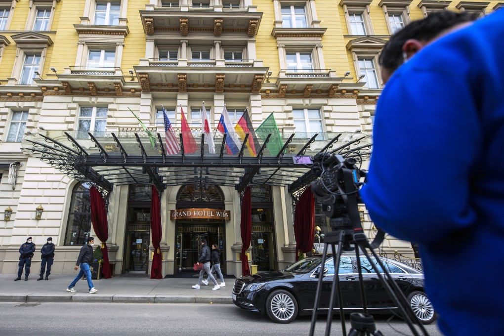 Police officers stand in front of the Grand Hotel in Vienna, where talks on the Iran nuclear deal were held on Tuesday. Photo: EPA-EFE