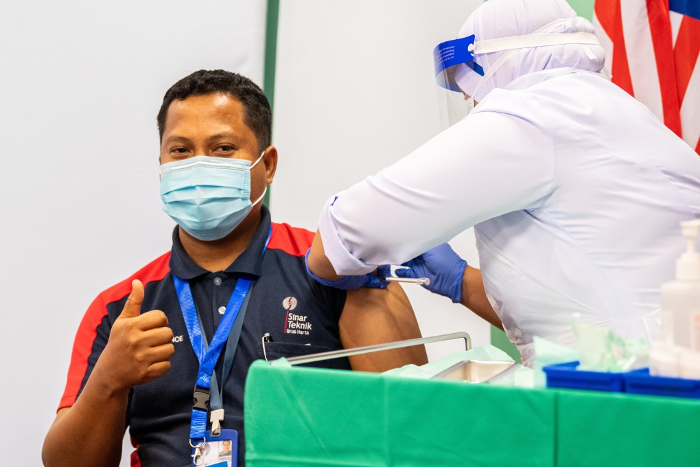 A man receives a dose of Sinovac’s Covid-19 vaccine at a hospital in Malaysia in March. Photo: Xinhua