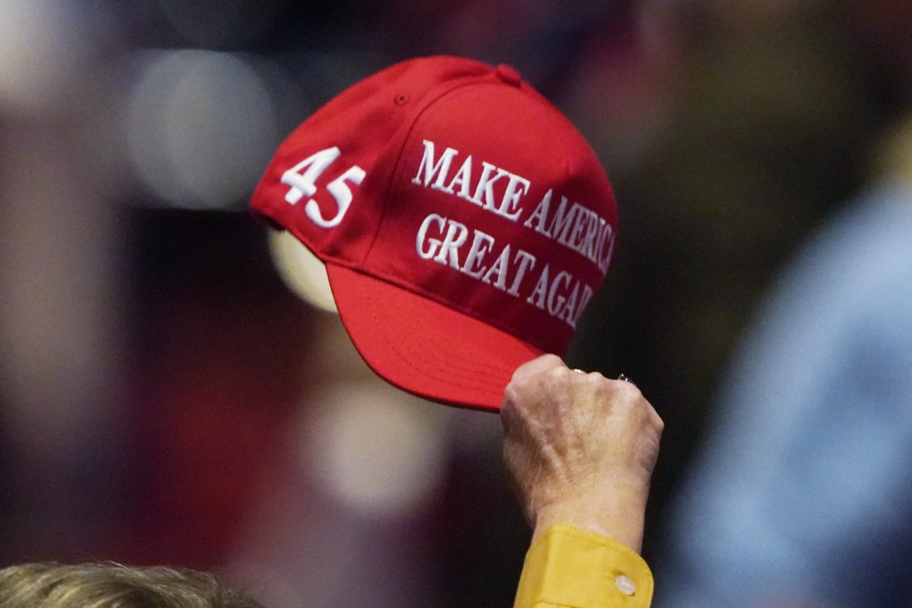 Donald Trump’s signature red ‘Make America Great Again’ hats are back in stock. File photo: AFP