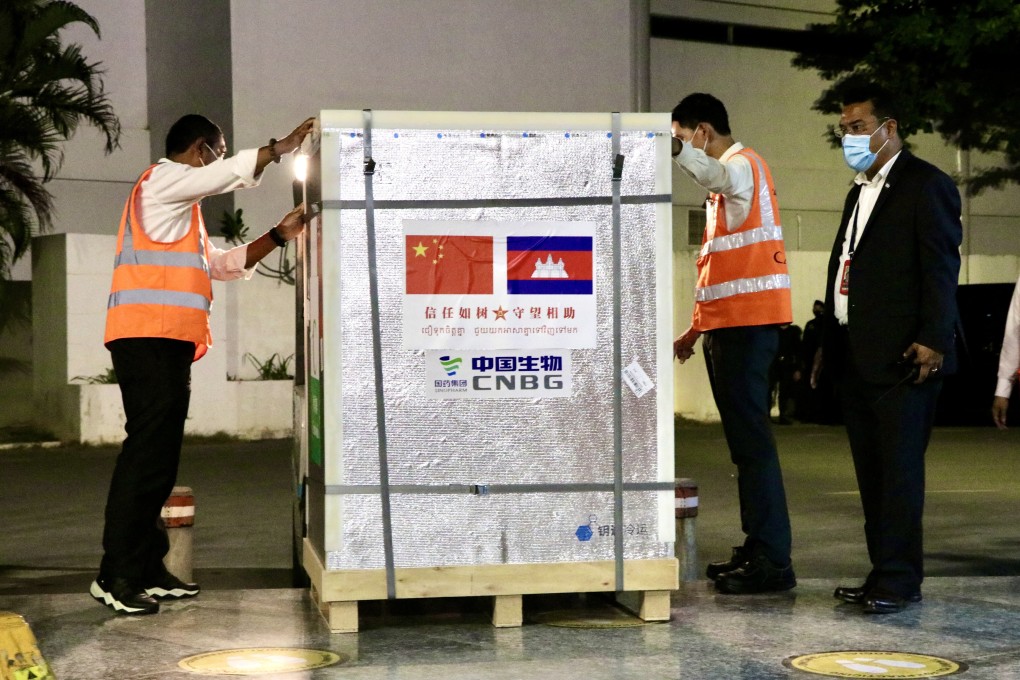 Workers unload Sinopharm vaccines at the Phnom Penh airport in March. Cambodia is one of more than 60 countries to receive vaccines from China. Photo: Xinhua