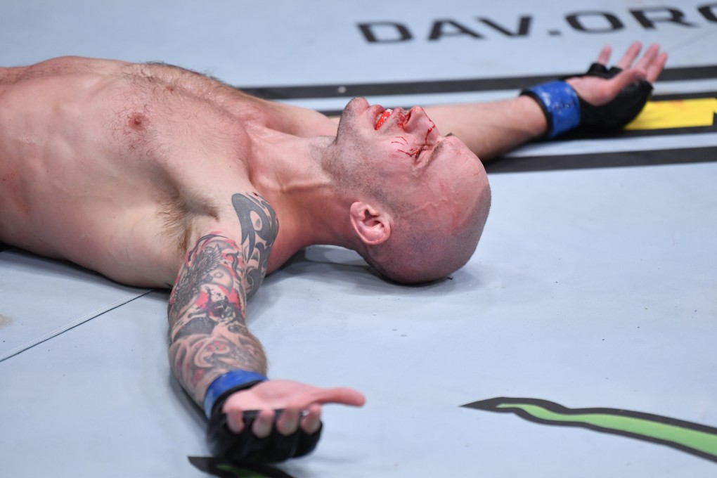 Sasha Palatnikov reacts after his TKO victory over Louis Cosce in their welterweight bout during the UFC 255. Photo: Jeff Bottari/Zuffa LLC