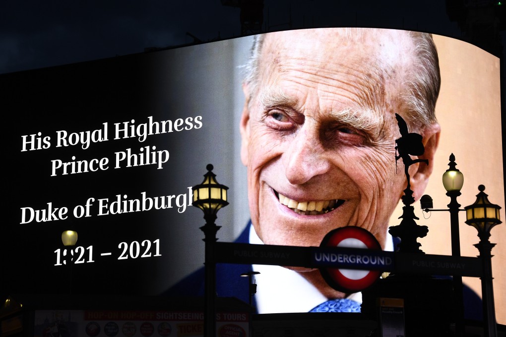 A tribute to Britain’s Prince Philip is projected onto a large screen at Piccadilly Circus in London on Friday. Photo: AP