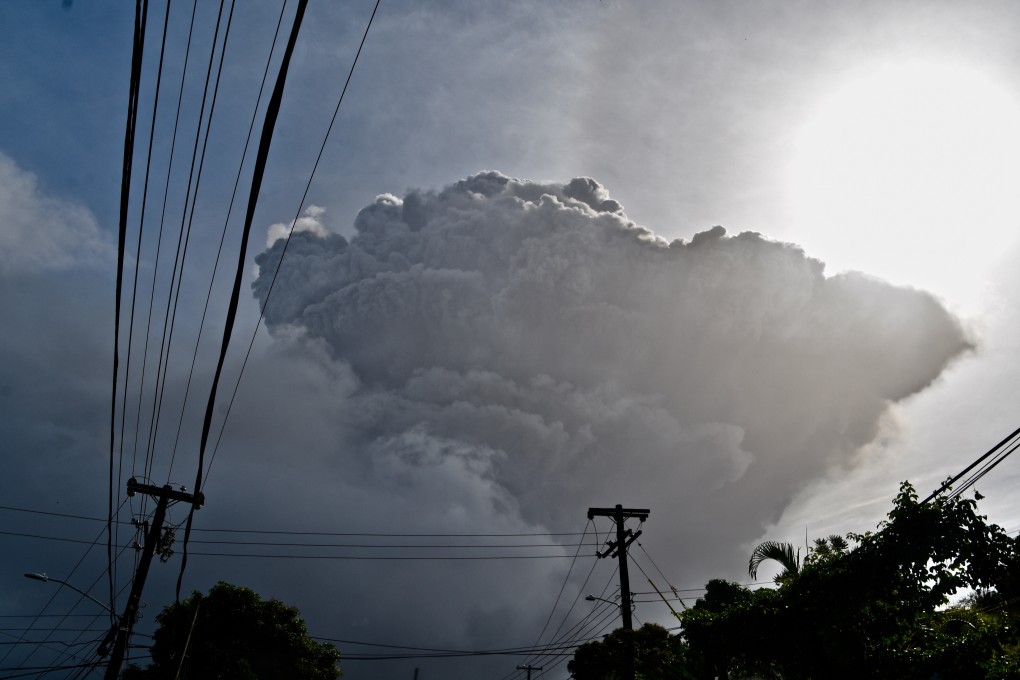 Ash rises into the air as La Soufriere volcano erupts on the eastern Caribbean island of St Vincent on Friday. Photo: AP